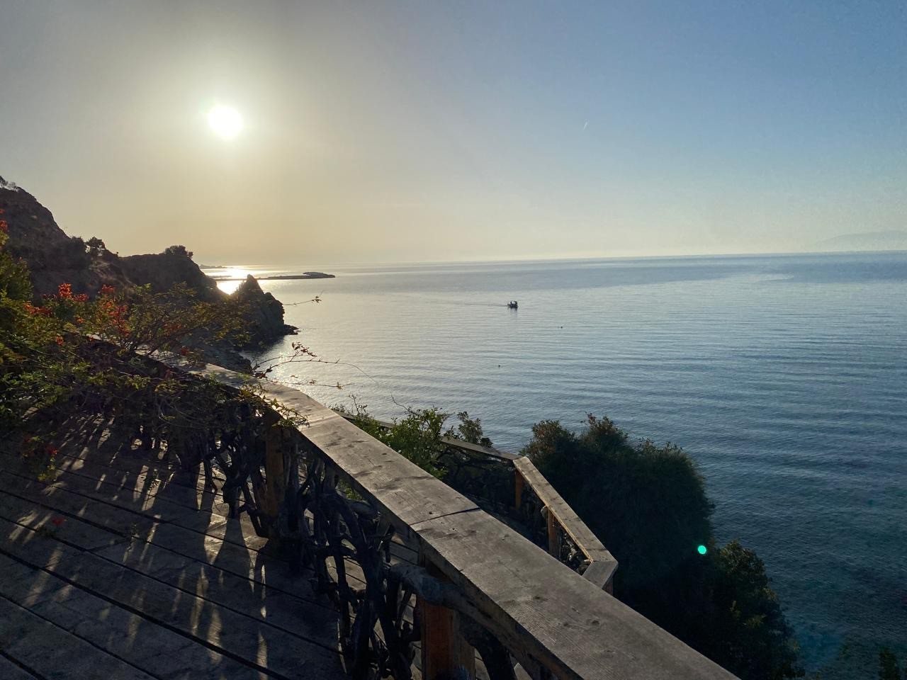 Dusk over the Aegean and the coast at Amodeli, seen from the deck