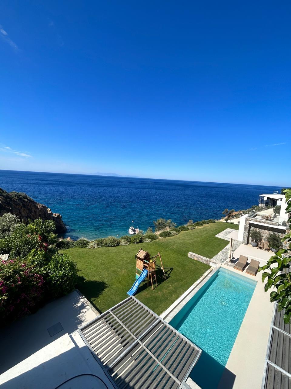 Aerial of garden, pool and cove