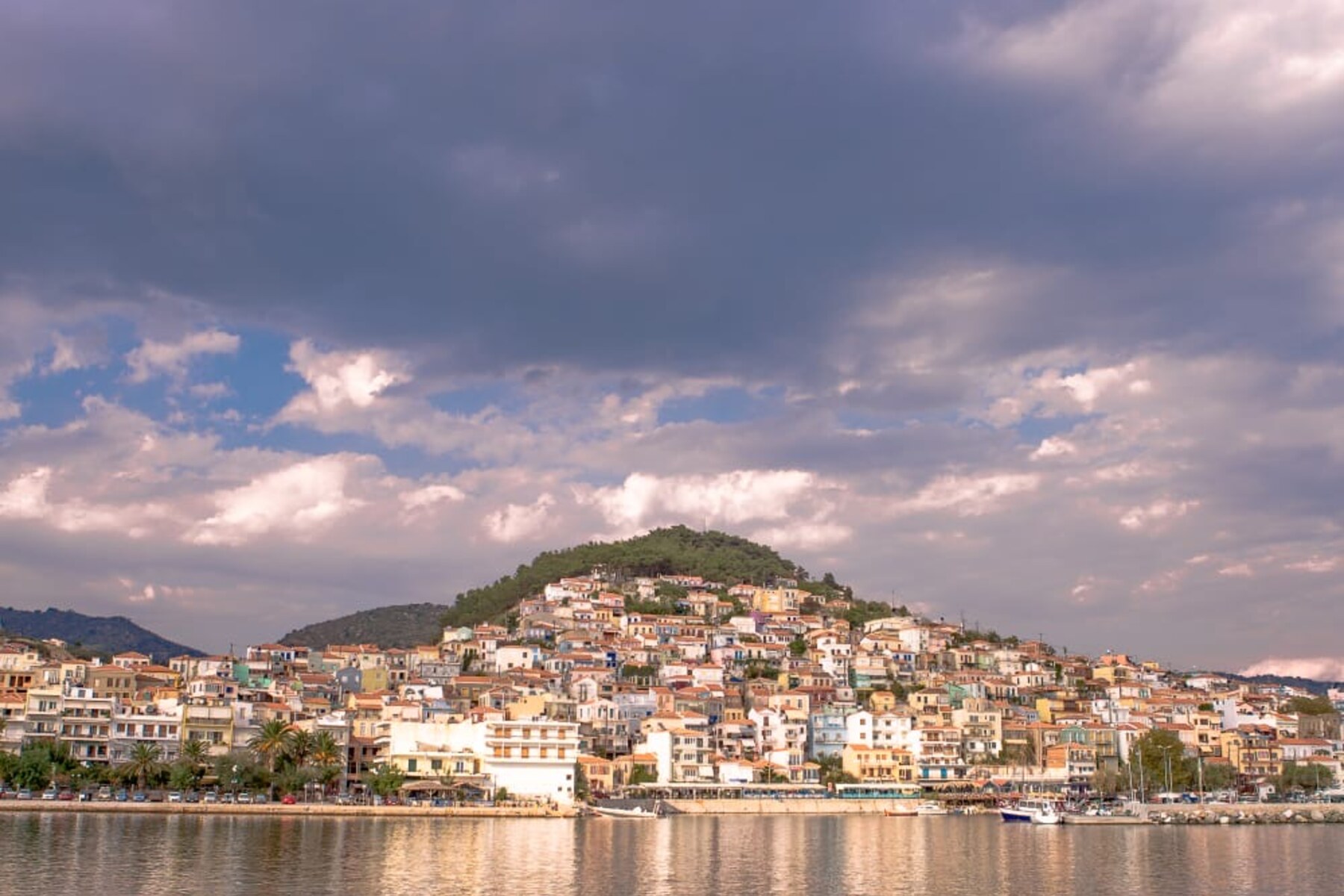 Plomari cascading down to the harbour, seen from the sea